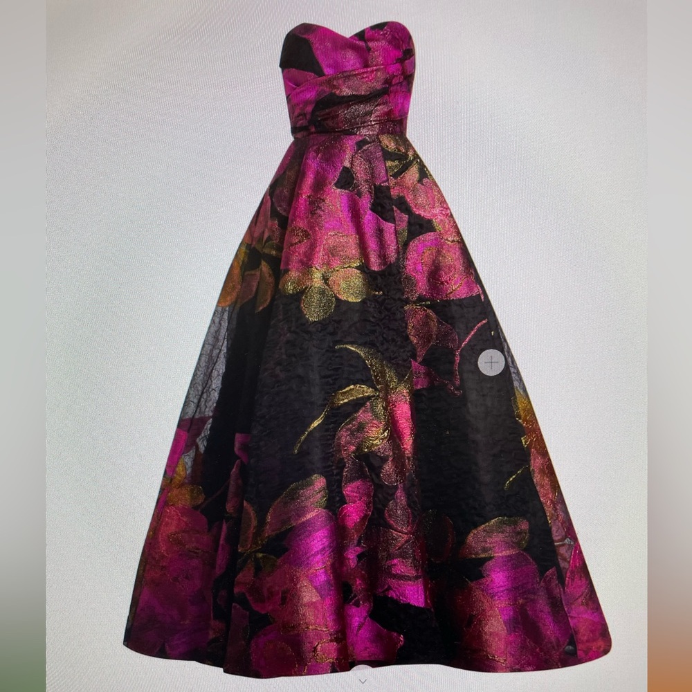 Amsale Cloq gown worn once has a small train with side slit pockets.